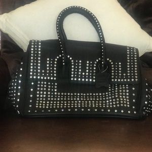 Leather Charm and Luck satchel by Jenny Syquia